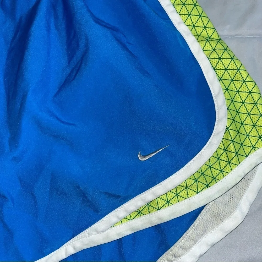 Nike Dri-Fit blue elastic waist lined shorts with green trim, adult size Medium